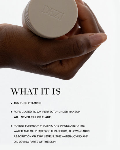 Hand holding the vitamin C bottle with text explaining what the product is. 
